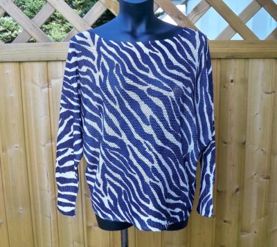 Stickad tröja Zebra